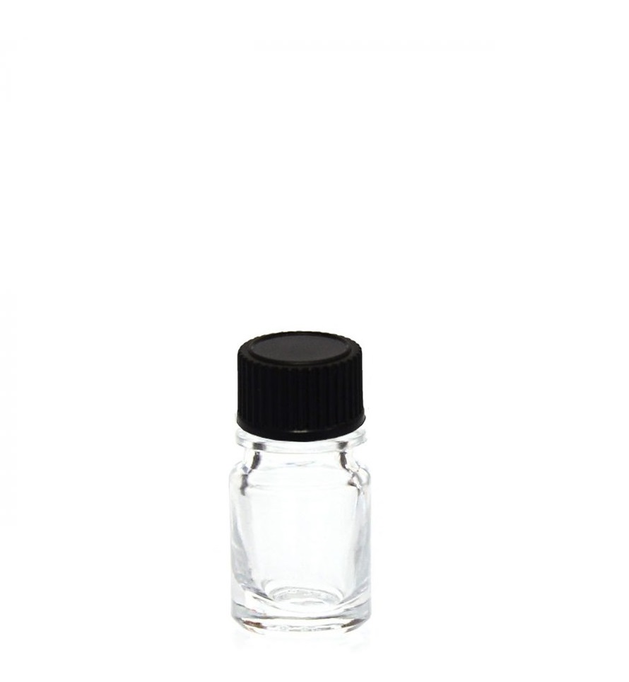 cadre vide blanc et petite bouteille en verre avec huile